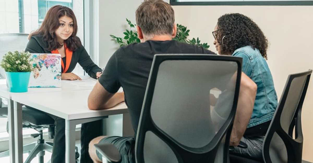 how-to-become-a-buyers-agent-in-new-south-wales Recruitment consultant interviewing two job candidates in an office